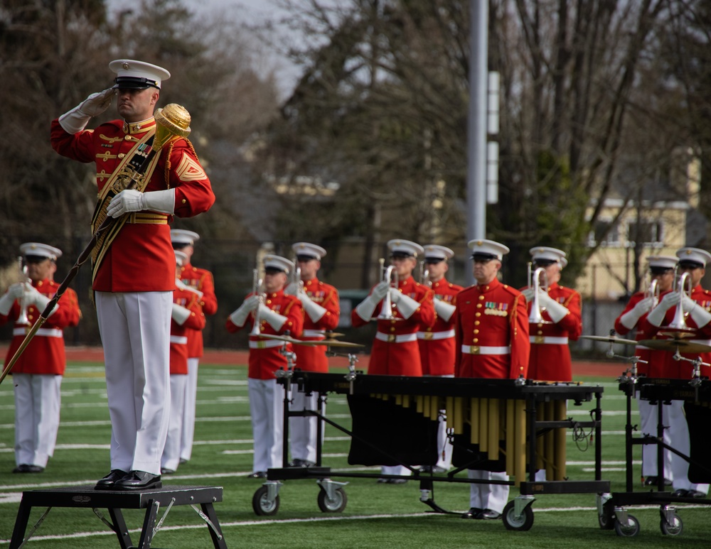 Marines of the Battle Color Detachment, Marine Barracks Washington, perform for students at Chief Sealth International High School, Seattle Washington.