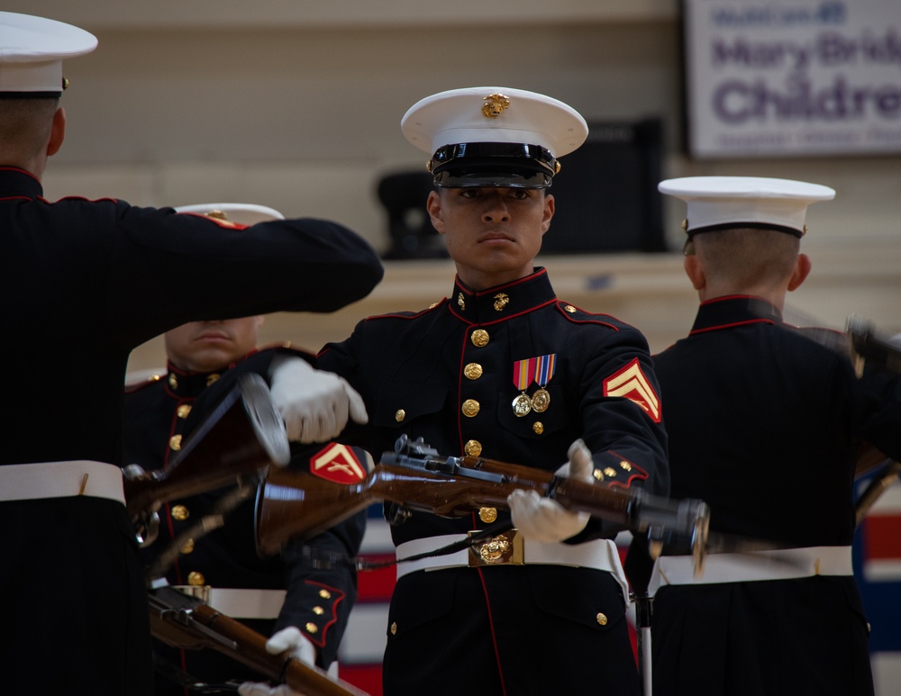 Marines of the Silent Drill Platoon, Marine Barracks Washington, performed for students at Silas High School in Tacoma, Washington.