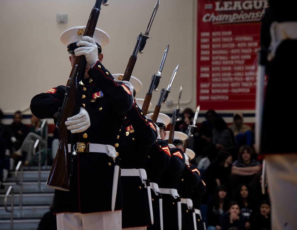 Marines of the Silent Drill Platoon, Marine Barracks Washington, performed for students at Silas High School in Tacoma, Washington.