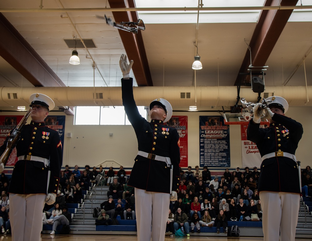 Marines of the Silent Drill Platoon, Marine Barracks Washington, performed for students at Silas High School in Tacoma, Washington.