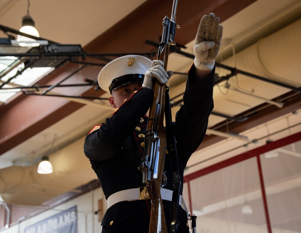 Marines of the Silent Drill Platoon, Marine Barracks Washington, performed for students at Silas High School in Tacoma, Washington.