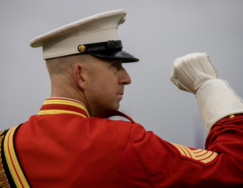 Marines with “The Commandant’s Own,” U.S. Marine Drum &amp; Bugle Corps, Marine Barracks Washington, perform during a Washington State Huskies baseball game, at Washington State University, Seattle Washington.