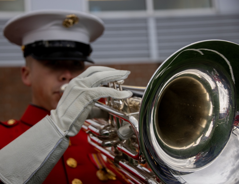 Marines with “The Commandant’s Own,” U.S. Marine Drum &amp; Bugle Corps, Marine Barracks Washington, perform during a Washington State Huskies baseball game, at Washington State University, Seattle Washington.