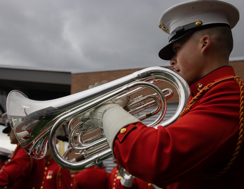 Marines with “The Commandant’s Own,” U.S. Marine Drum &amp; Bugle Corps, Marine Barracks Washington, perform during a Washington State Huskies baseball game, at Washington State University, Seattle Washington.