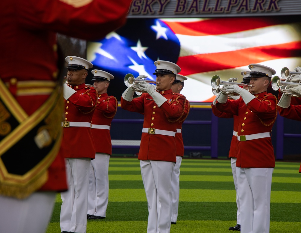 Marines with “The Commandant’s Own,” U.S. Marine Drum &amp; Bugle Corps, Marine Barracks Washington, perform during a Washington State Huskies baseball game, at Washington State University, Seattle Washington.