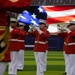 Marines with “The Commandant’s Own,” U.S. Marine Drum &amp; Bugle Corps, Marine Barracks Washington, perform during a Washington State Huskies baseball game, at Washington State University, Seattle Washington.