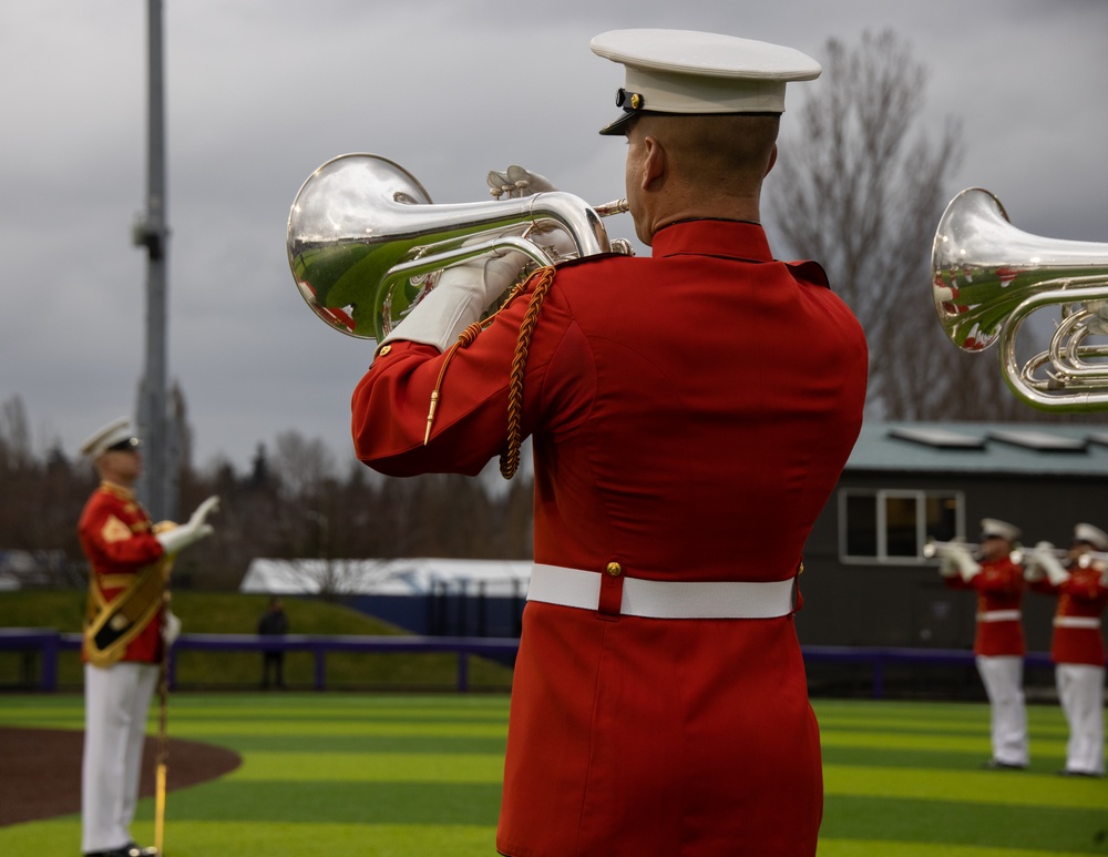 Marines with “The Commandant’s Own,” U.S. Marine Drum &amp; Bugle Corps, Marine Barracks Washington, perform during a Washington State Huskies baseball game, at Washington State University, Seattle Washington.