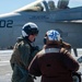 USS Carl Vinson (CVN 70) Commanding Officer Pilots an F/A-18E Super Hornet