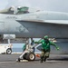 USS Carl Vinson (CVN 70) Commanding Officer Pilots an F/A-18E Super Hornet