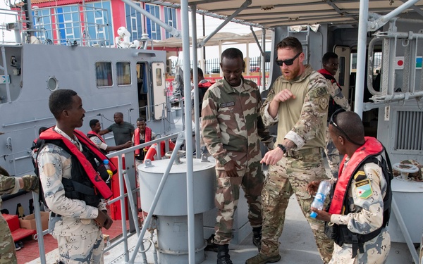 U.S. Navy and Coast Guard members partner with Djiboutian Coast Guardsmen to execute the final Cutlass Express 2023 event