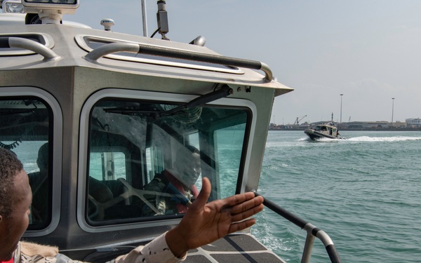 U.S. Navy and Coast Guard members partner with Djiboutian Coast Guardsmen to execute the final Cutlass Express 2023 event