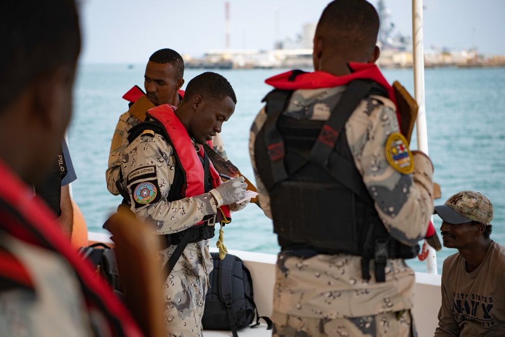 U.S. Navy and Coast Guard members partner with Djiboutian Coast Guardsmen to execute the final Cutlass Express 2023 event