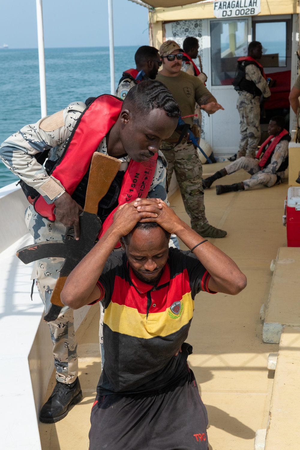 U.S. Navy and Coast Guard members partner with Djiboutian Coast Guardsmen to execute the final Cutlass Express 2023 event