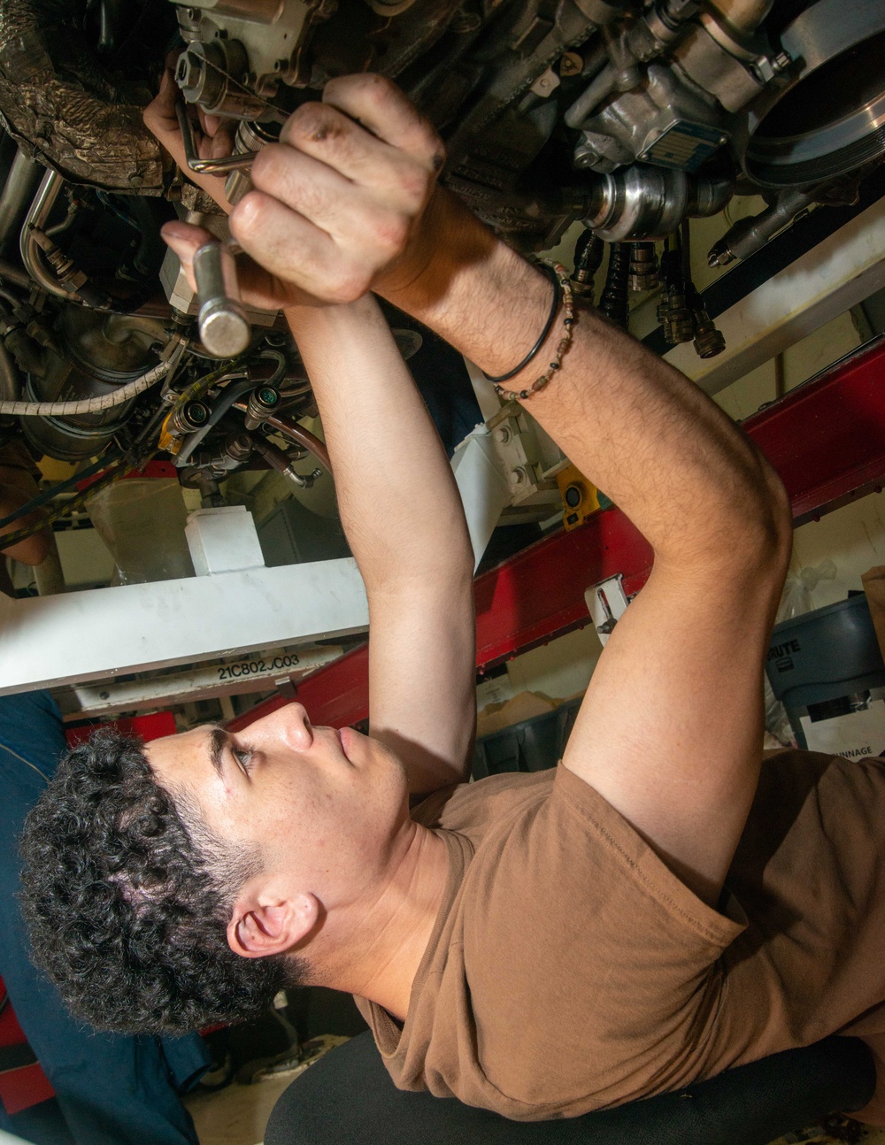 Sailor Removes Engine Valve