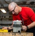 Sailor Disassembles Bomb Rack