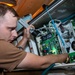 Sailor Removes Power Supply Circuit Board from an SFC Unit