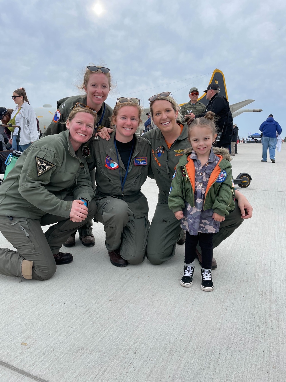 All-Woman Pilot Team of HSC-3 poses with a fan