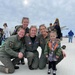 All-Woman Pilot Team of HSC-3 poses with a fan