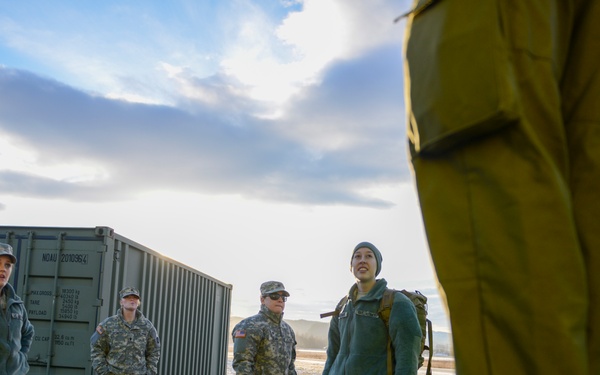 Warmly welcomed, the U.S. contingent arrives