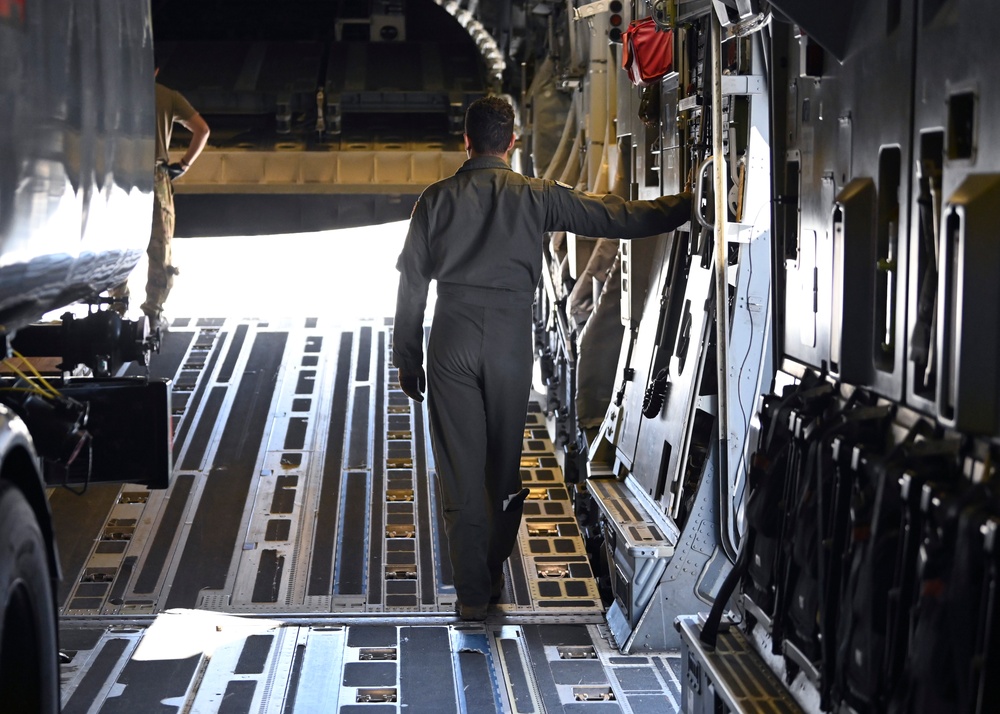 Furthering agility and lethality: McChord C-17s refuel, re-arm F-35s