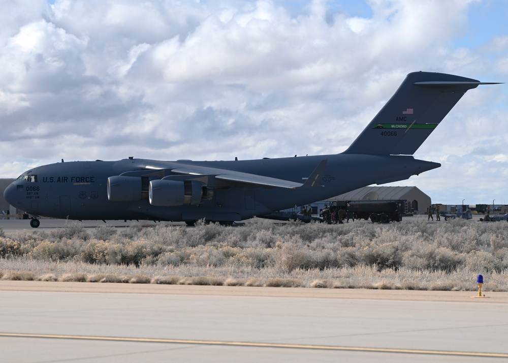 Furthering agility and lethality: McChord C-17s refuel, re-arm F-35s