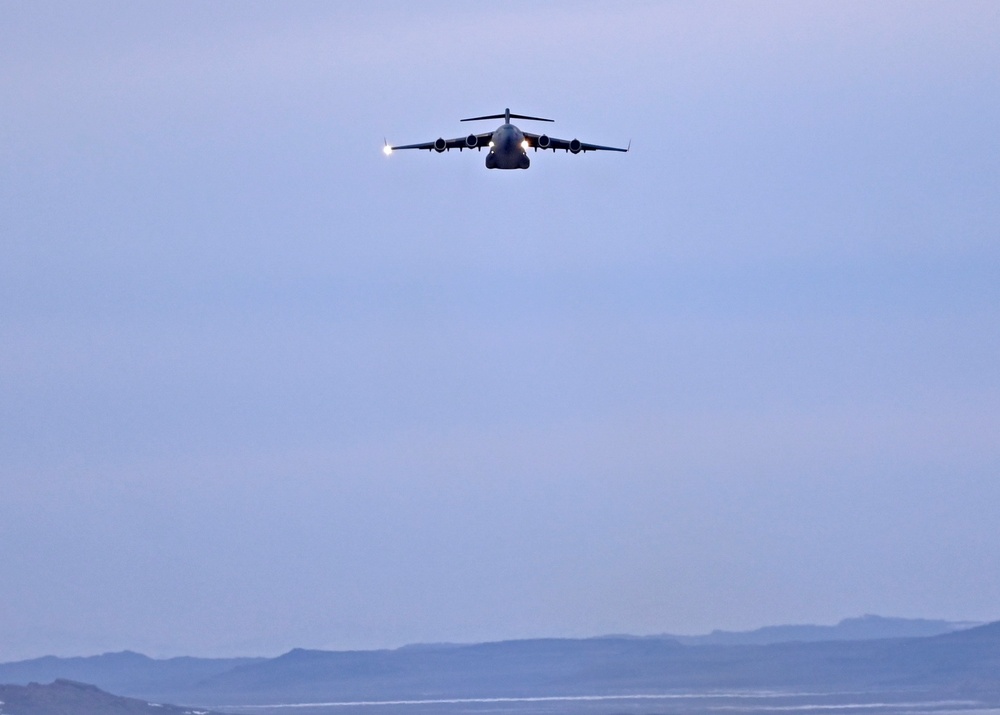 Furthering agility and lethality: McChord C-17s refuel, re-arm F-35s