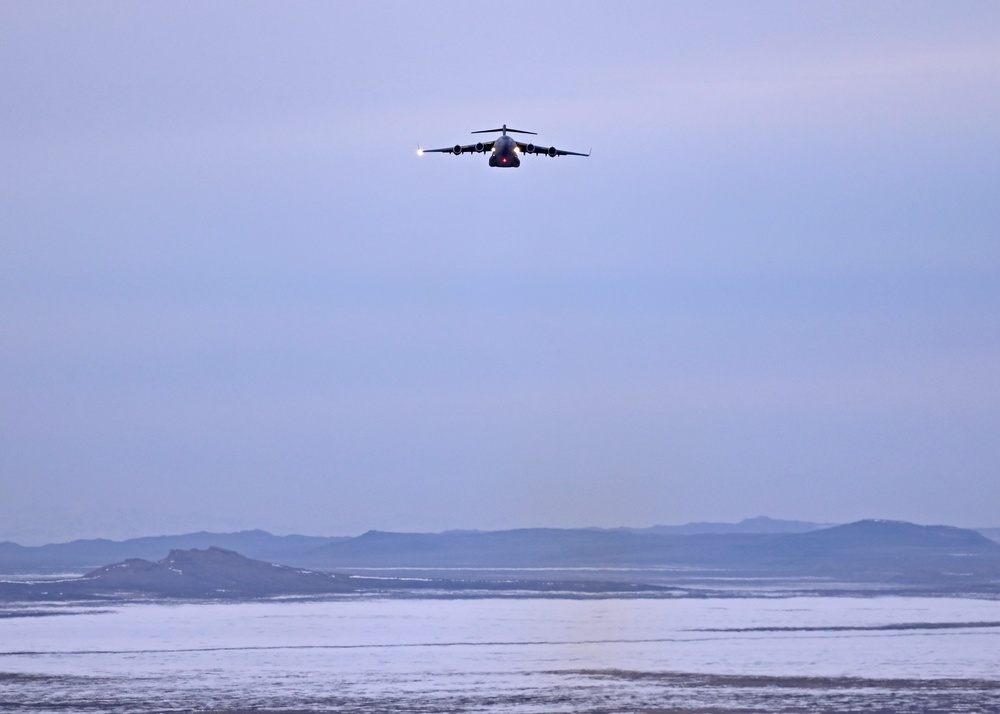 Furthering agility and lethality: McChord C-17s refuel, re-arm F-35s