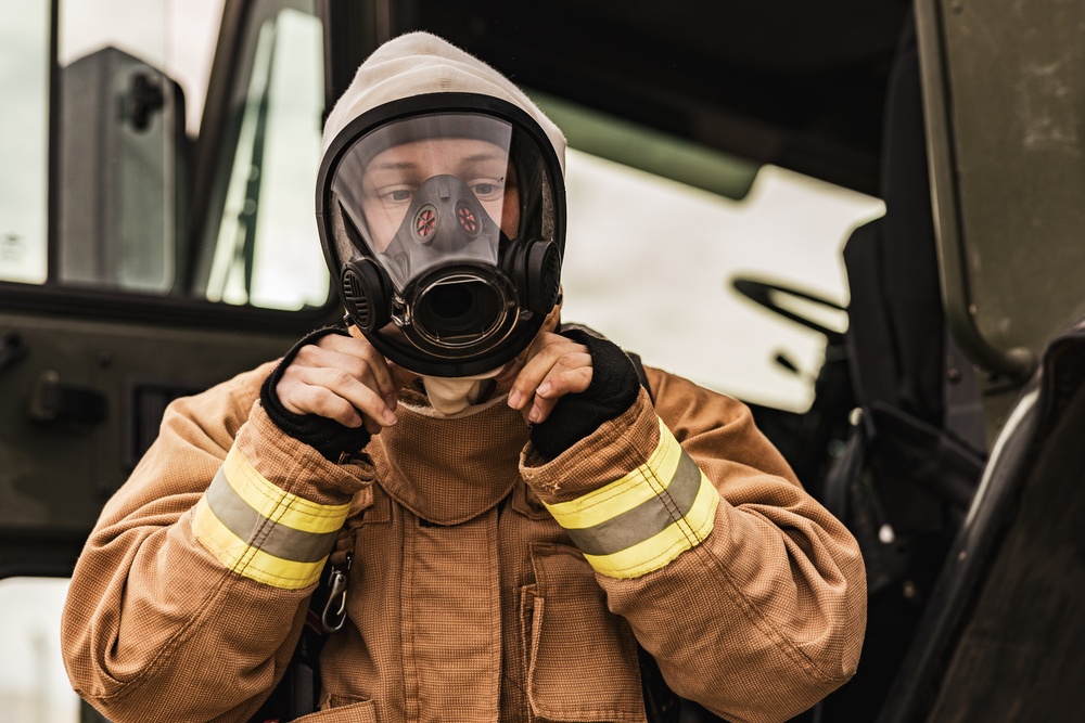 Aircraft rescue, firefighting Marines team up with MCAGCC Fire Department during a mass casualty drill