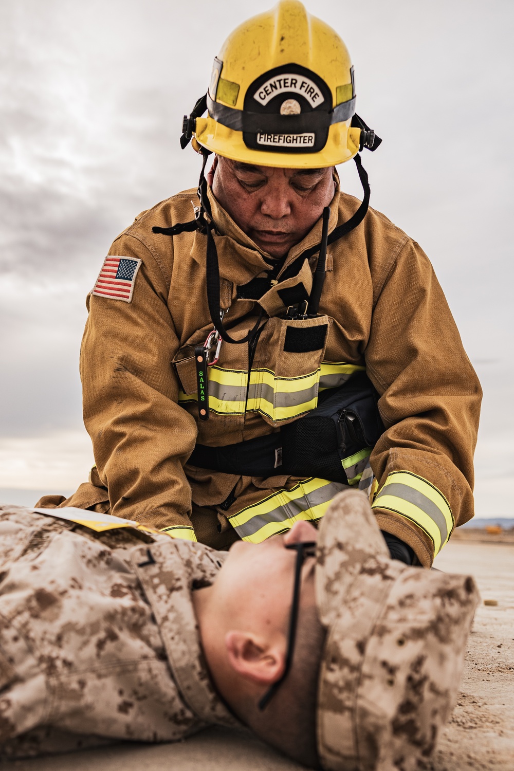 Aircraft rescue, firefighting Marines team up with MCAGCC Fire Department during a mass casualty drill