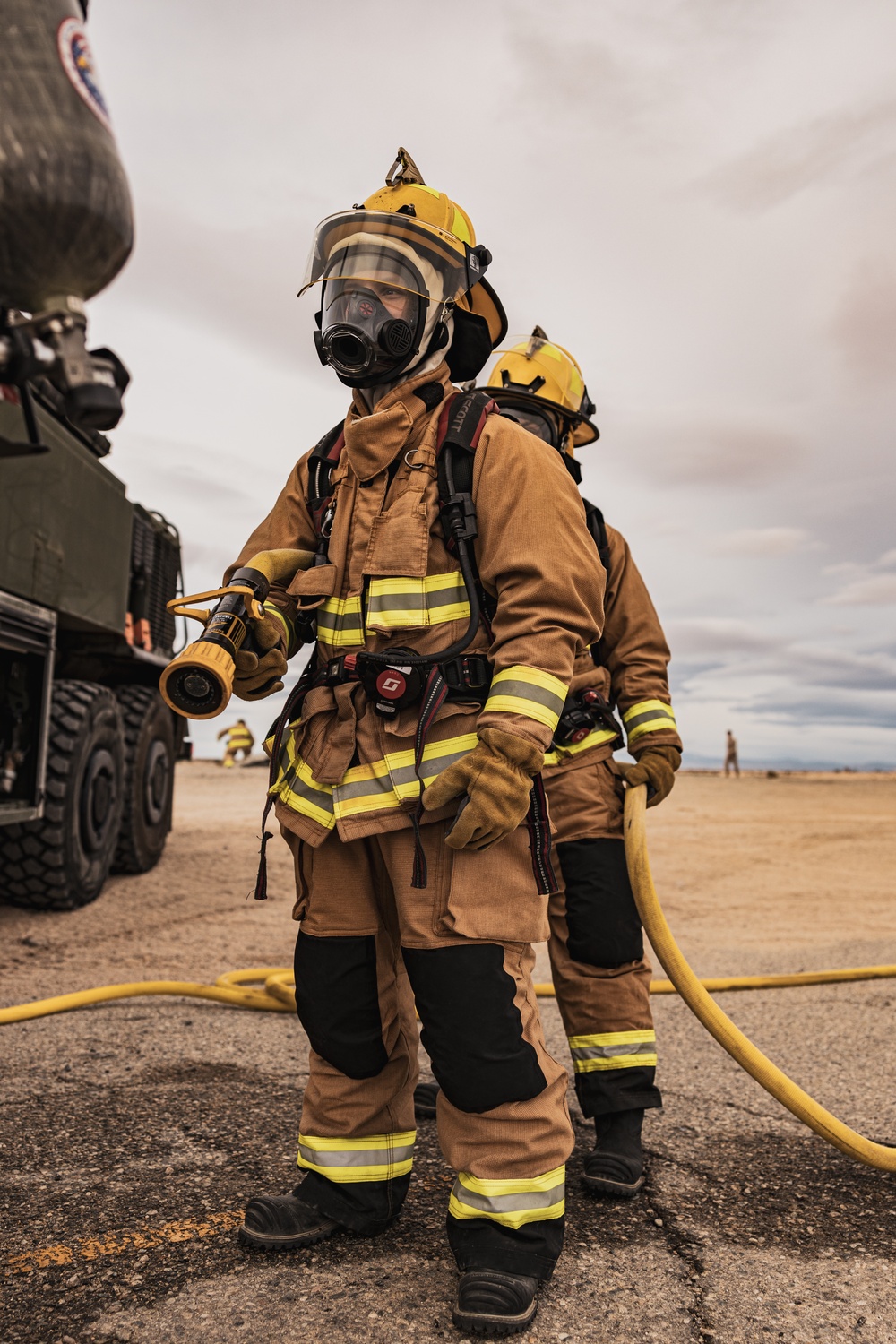 Aircraft rescue, firefighting Marines team up with MCAGCC Fire Department during a mass casualty drill