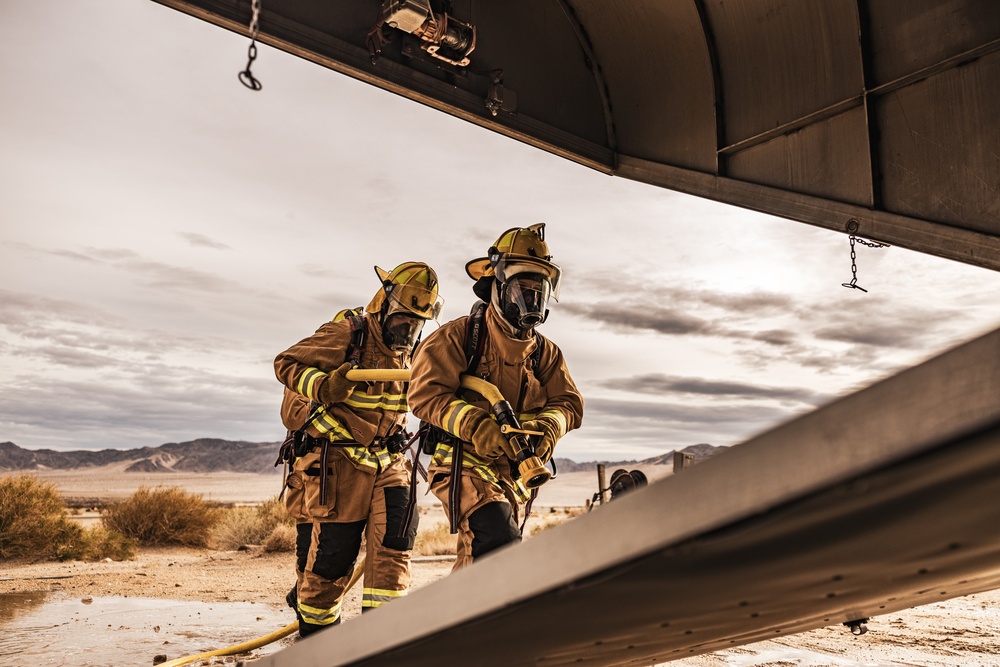 Aircraft rescue, firefighting Marines team up with MCAGCC Fire Department during a mass casualty drill