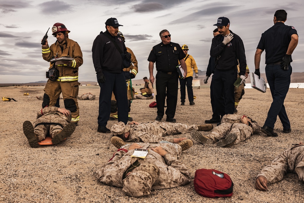 Aircraft rescue, firefighting Marines team up with MCAGCC Fire Department during a mass casualty drill