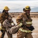 Aircraft rescue, firefighting Marines team up with MCAGCC Fire Department during a mass casualty drill