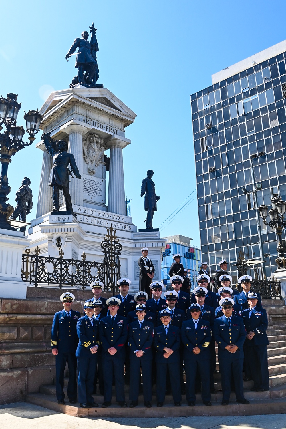 U.S. Coast Guard Polar Star crew render honors to the Heroes of the Battle of Iquique changing of the guard ceremony