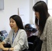 Two former USAG Japan college interns return as full-time employees