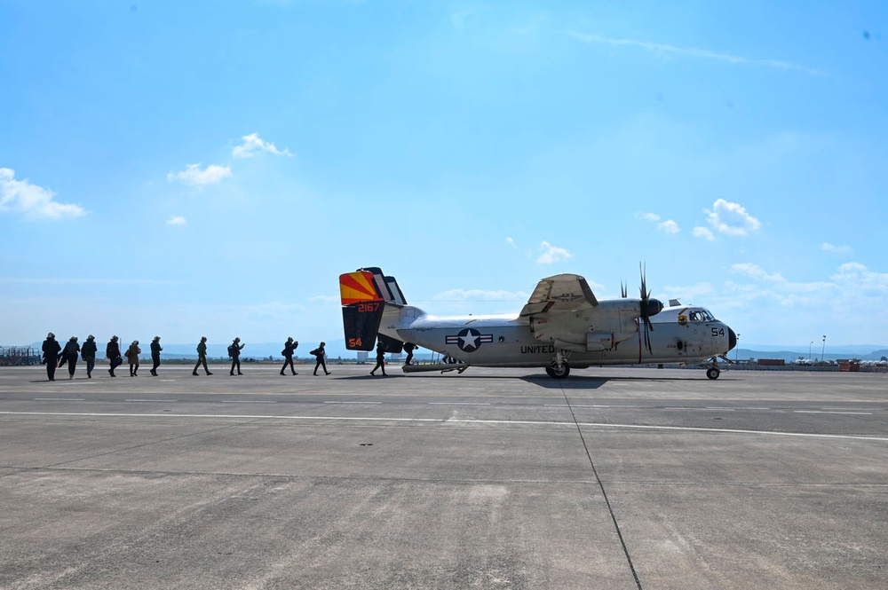 Consul General and Distinguished Visitors take COD to USS Bush