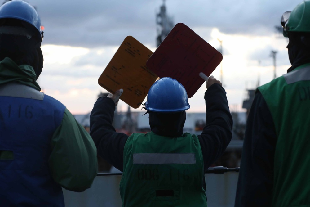 USS Thomas Hudner (DDG 116) conducts a replenishment at sea