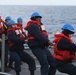 USS Thomas Hudner (DDG 116) conducts a replenishment at sea