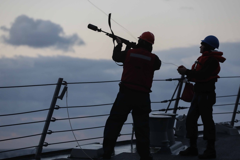 USS Thomas Hudner (DDG 116) during a replenishment at sea