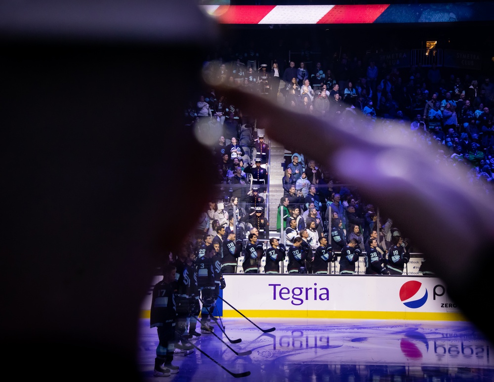 Marines of the Silent Drill Platoon, Marine Barracks Washington, honor those who came before us during a Seattle Krakens hockey game.