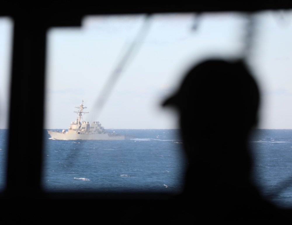 A view from USS Thomas Hudner (DDG 116) of the USS McFaul (DDG 74) while underway