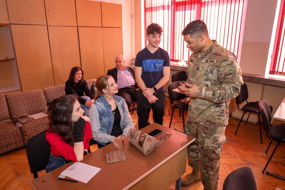 Soldier explains MREs to Bulgarian students