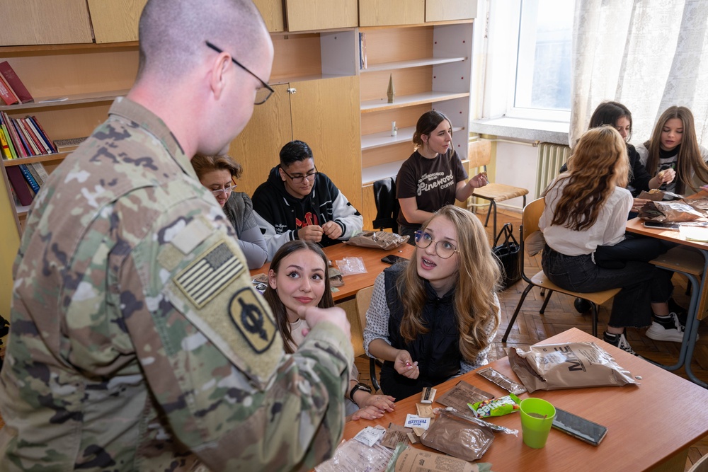 Soldier explains MREs to Bulgarian Students