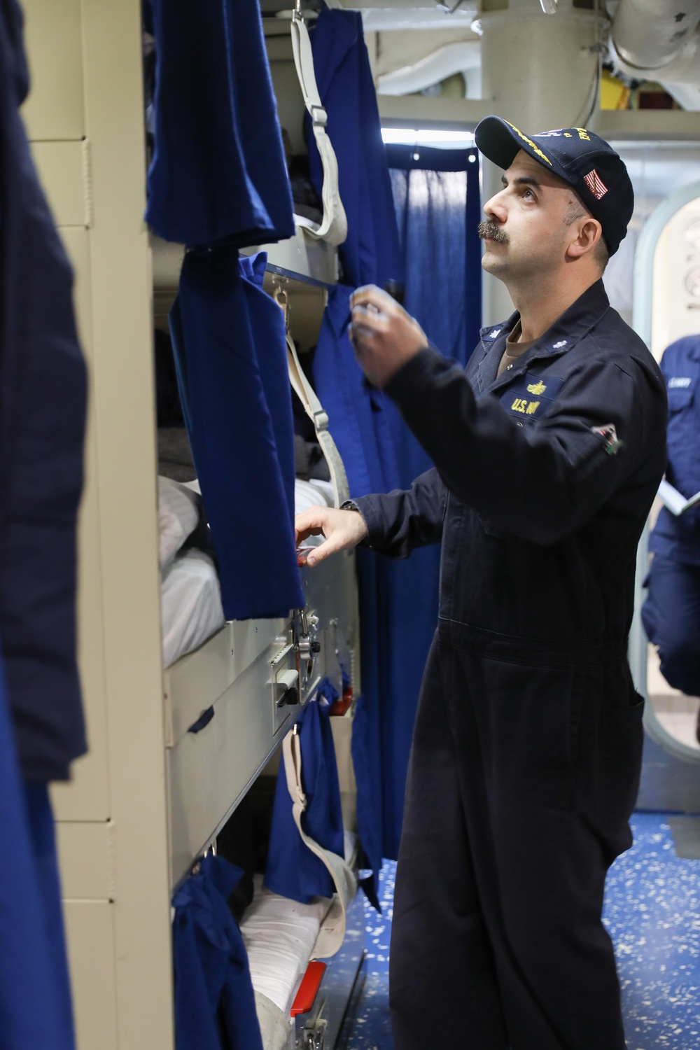 USS Ramage (DDG 61) performs a berthing inspection