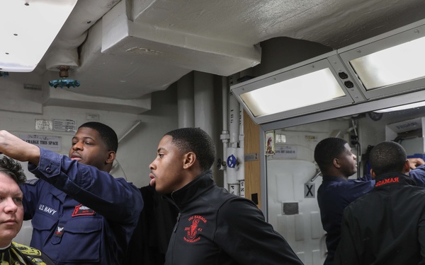 USS Ramage (DDG 61) Sailor receives a haircut in the ships barber shop