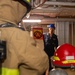 Sailors simulate fighting a fire