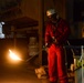 Contractor welds aboard the USS John C. Stennis