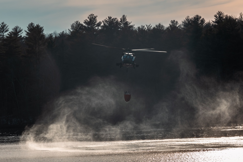 Rhode Island Army National Guard conducts UH-60 BAMBI Bucket training on 3 March 2023.