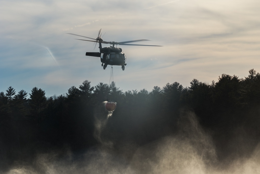 Rhode Island Army National Guard conducts UH-60 BAMBI Bucket training on 3 March 2023.