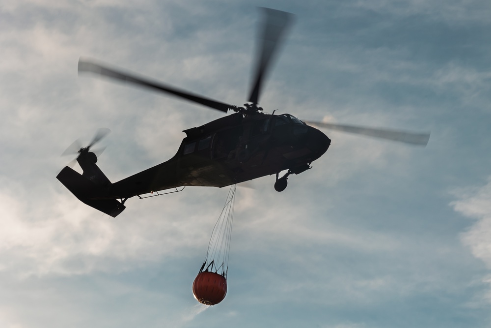 Rhode Island Army National Guard conducts UH-60 BAMBI Bucket training on 3 March 2023.